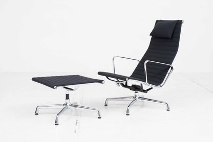 Vitra EA 124 armchair and EA 125 ottoman by Charles and Ray Eames in black Hopsak