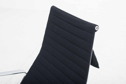 Vitra EA 124 armchair and EA 125 ottoman by Charles and Ray Eames in black Hopsak