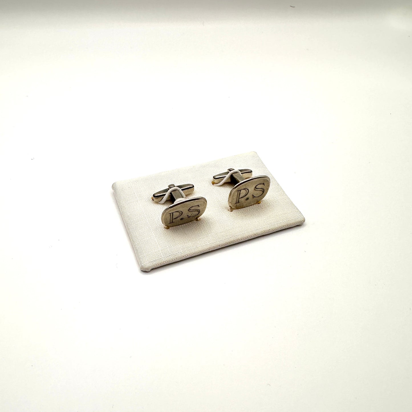 Vintage Manschettenknopf „P.S.“ aus 800er Silber