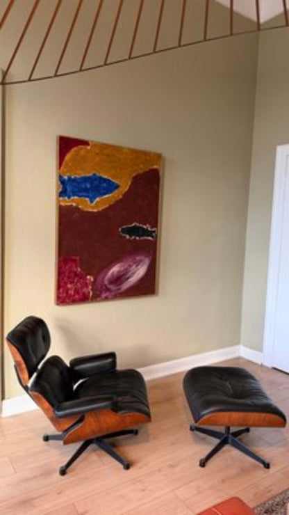 Vintage Sessel und Fußhocker von Charles und Ray Eames für Herman Miller und Vitra