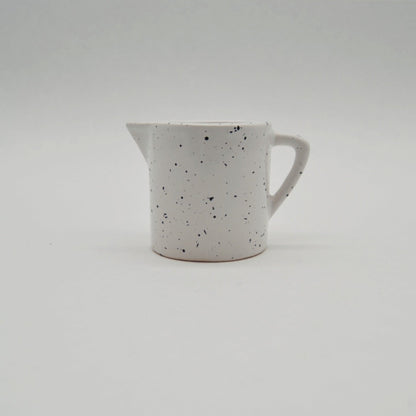 Vintage jug by Asa white/black speckled