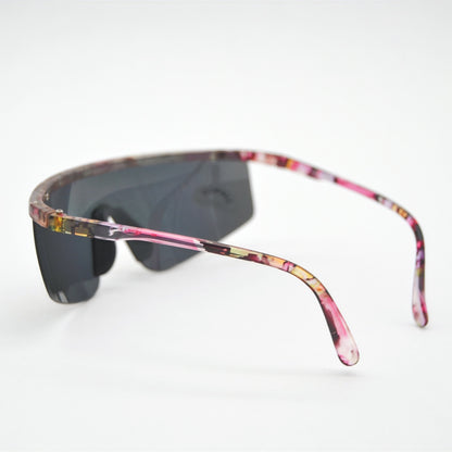 Lunettes de soleil vintage à motifs roses