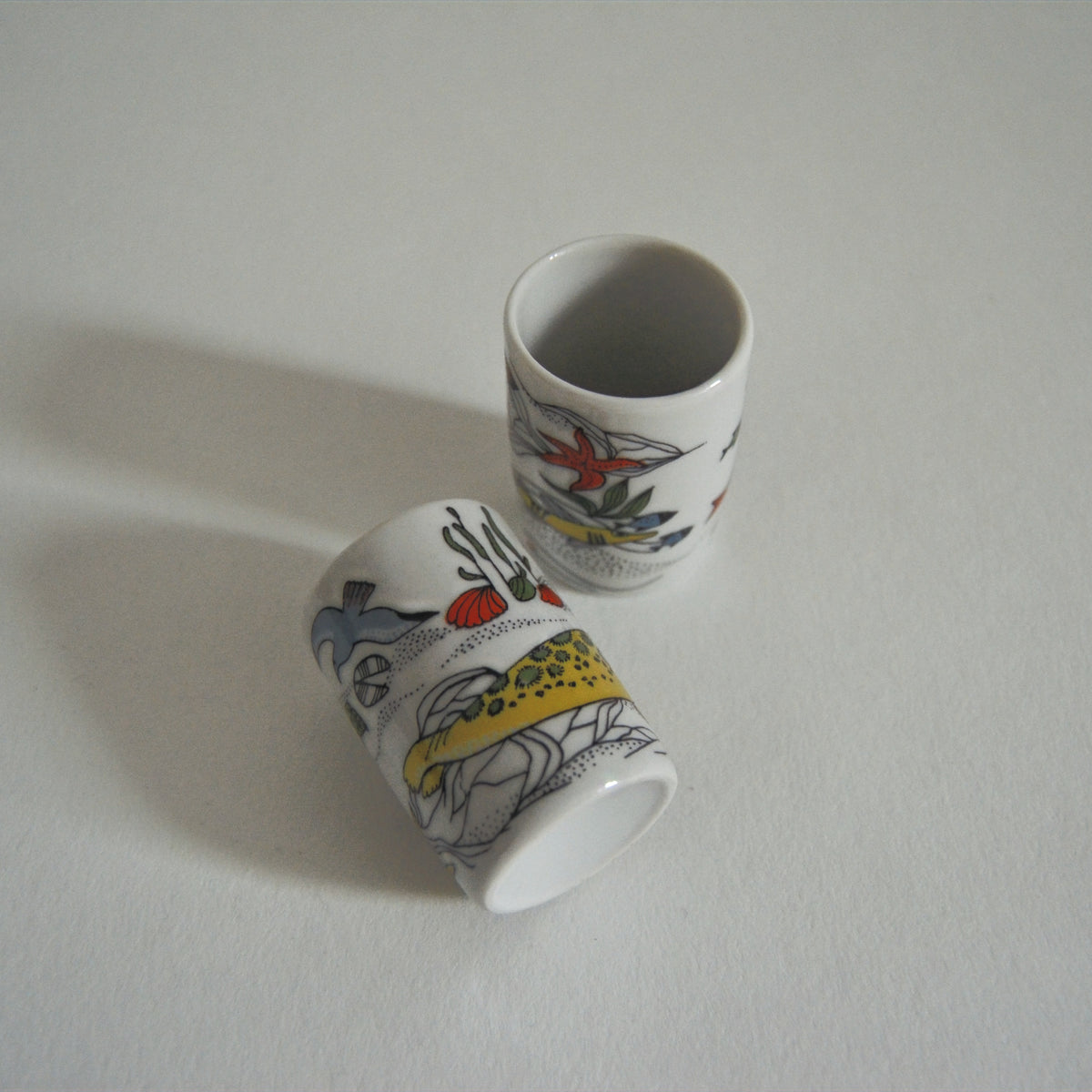 Set von 2 Vintage Schnapsbecher mit Meeresmotiven