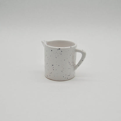 Vintage jug by Asa white/black speckled