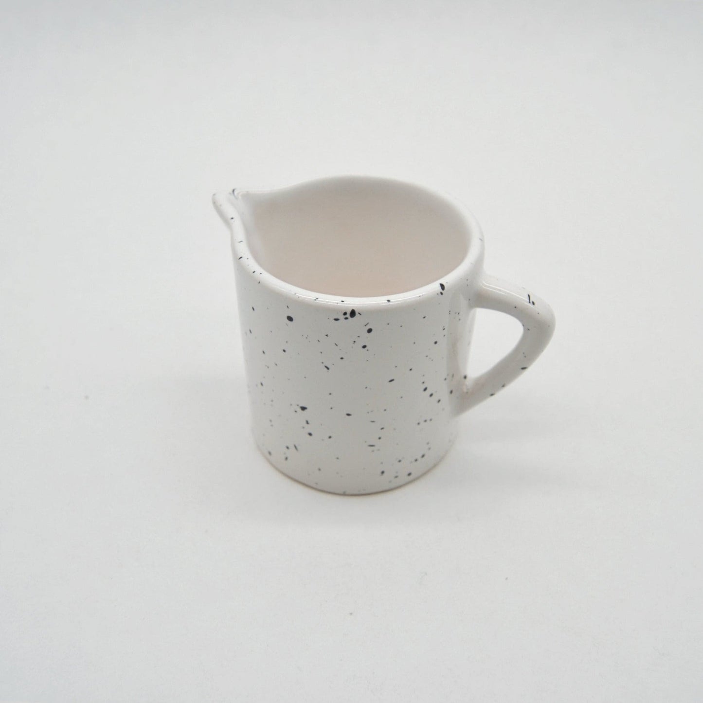 Vintage jug by Asa white/black speckled
