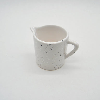 Vintage jug by Asa white/black speckled