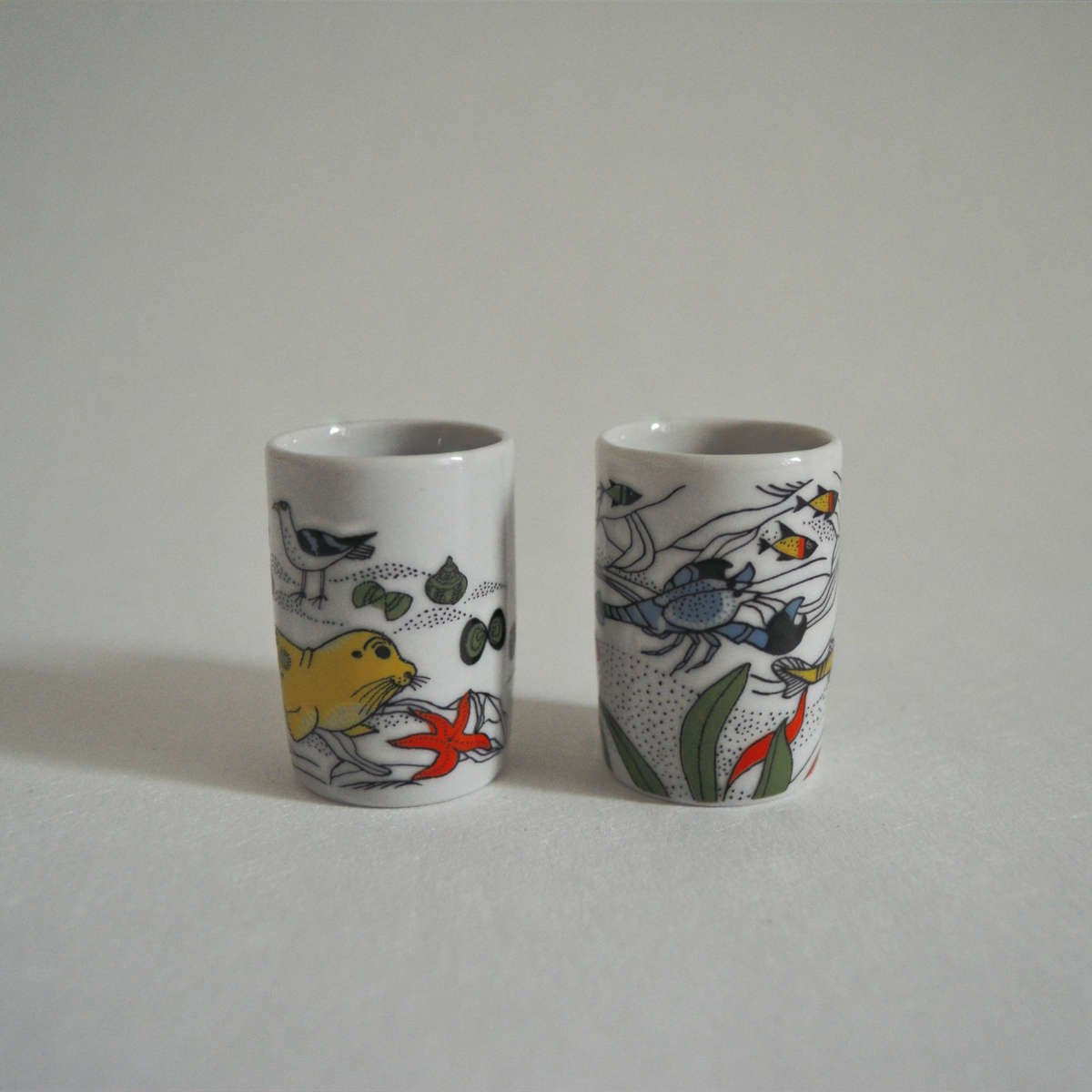 Set von 2 Vintage Schnapsbecher mit Meeresmotiven