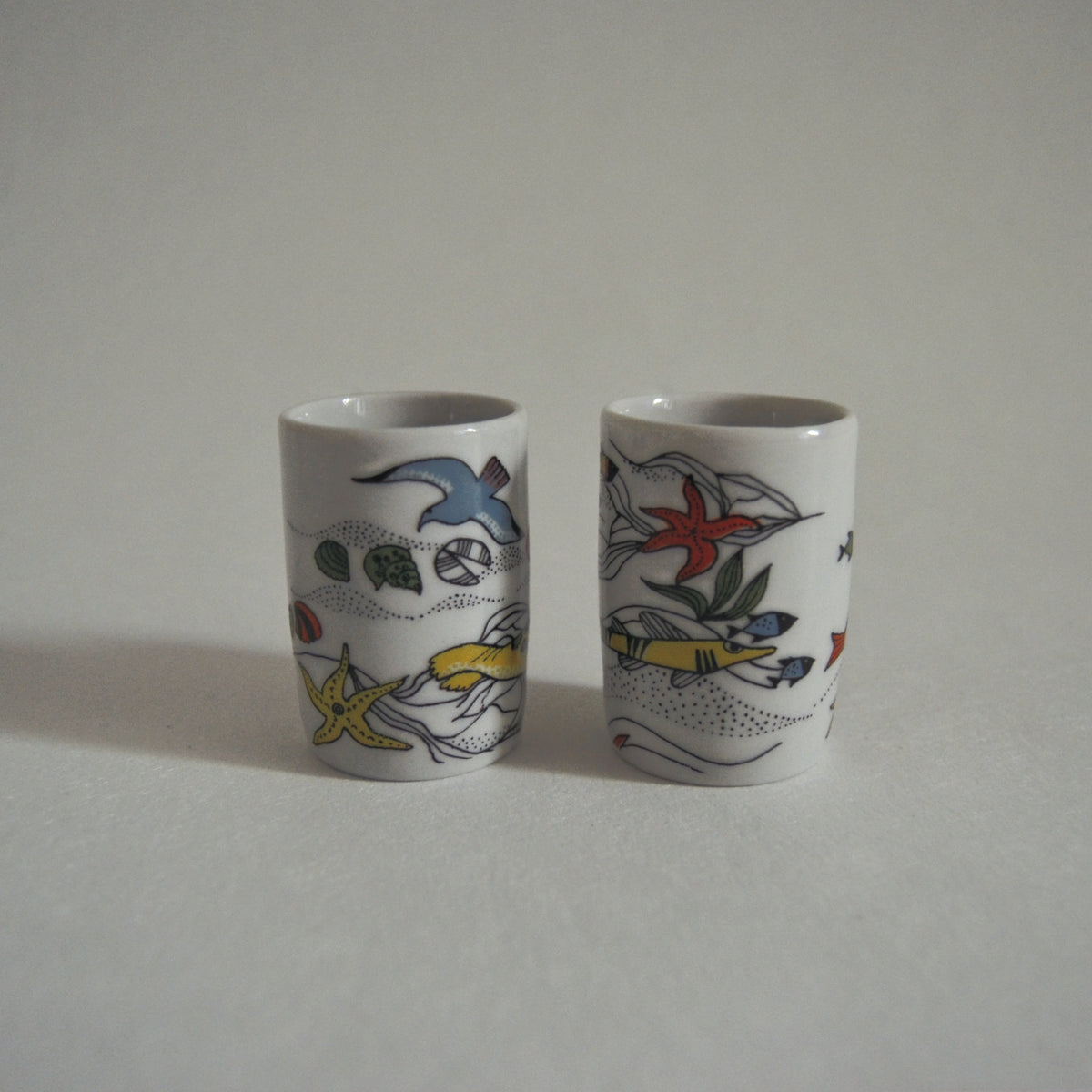 Set von 2 Vintage Schnapsbecher mit Meeresmotiven