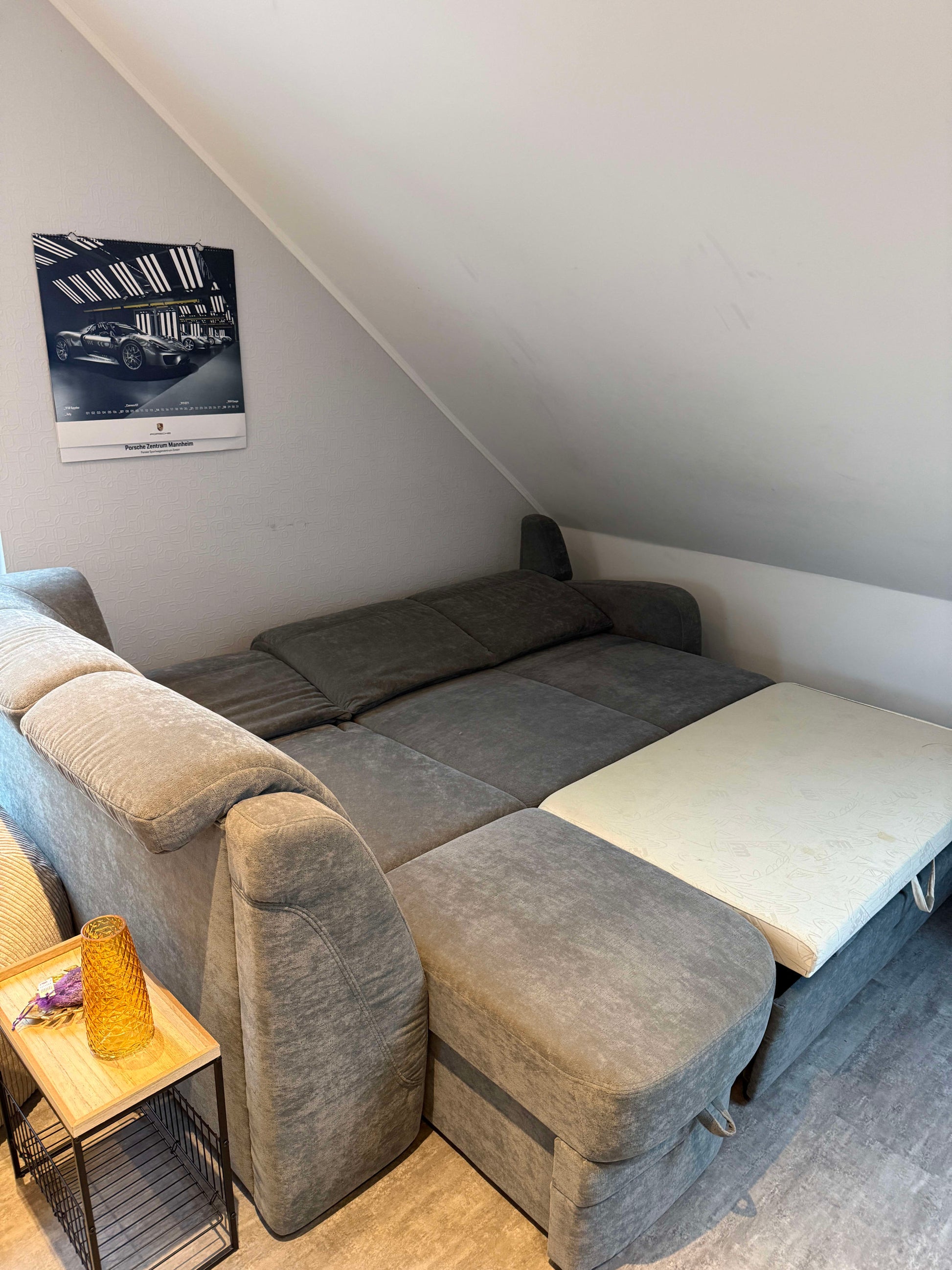 Ecksofa mit Schlaffunktion und Bettkasten von Oelsa in Grau Pre-Loved