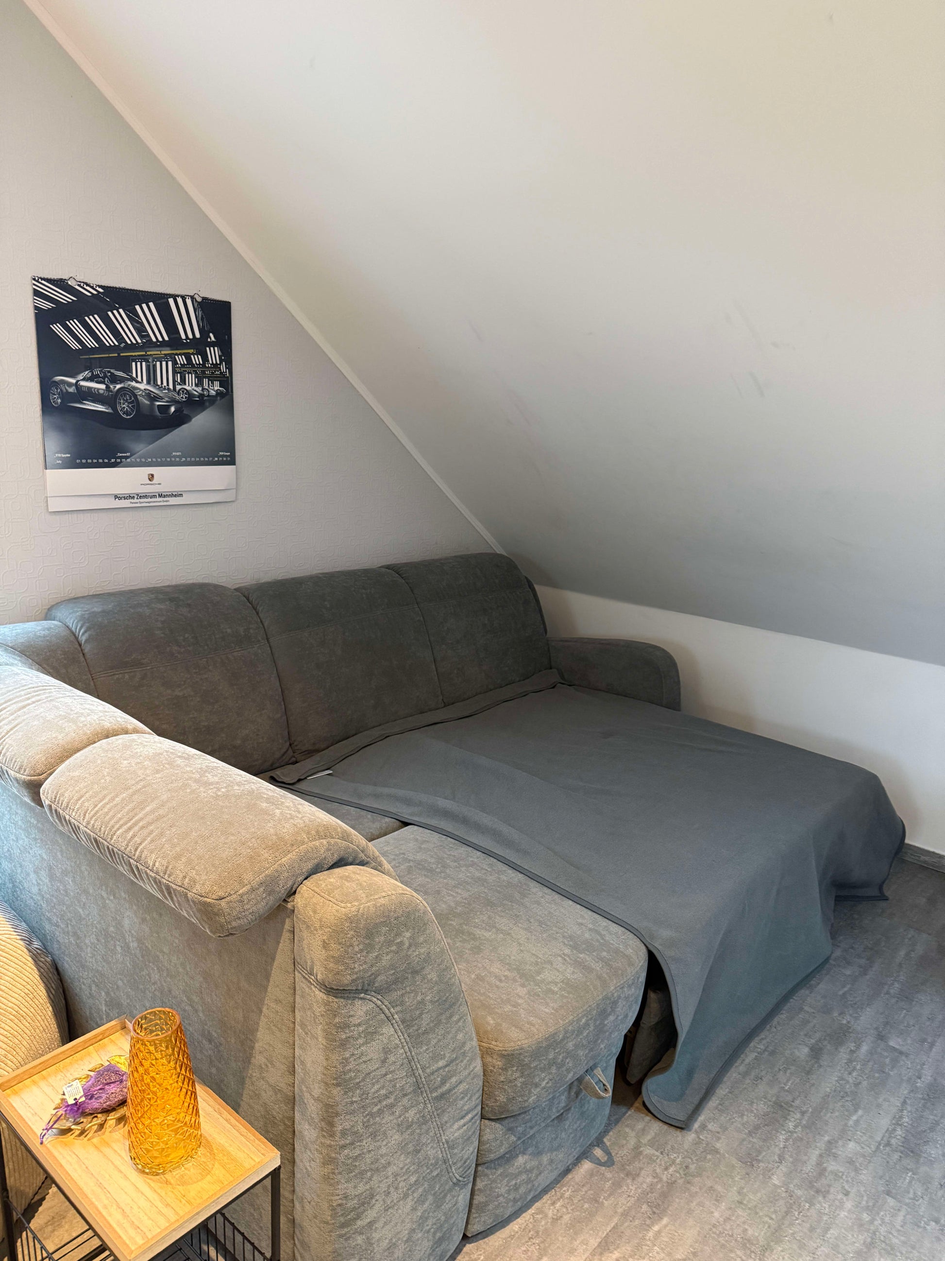 Ecksofa mit Schlaffunktion und Bettkasten von Oelsa in Grau Pre-Loved