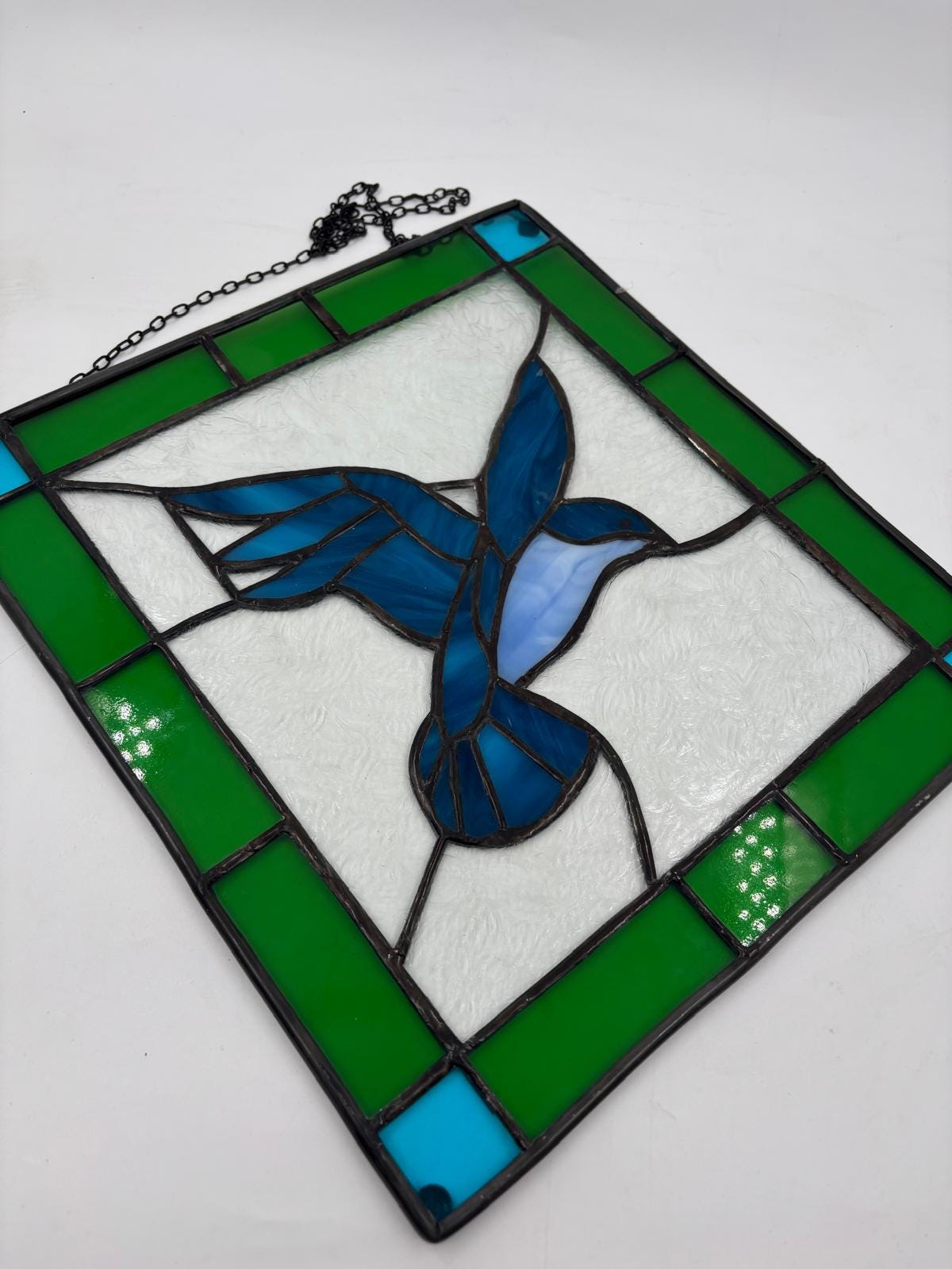 Vintage Fensterbild aus Glas mit blauem Vogel