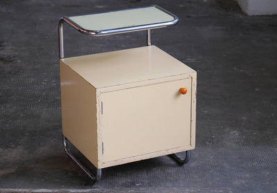 Vintage Bauhaus-style bedside table with glass top in off-white