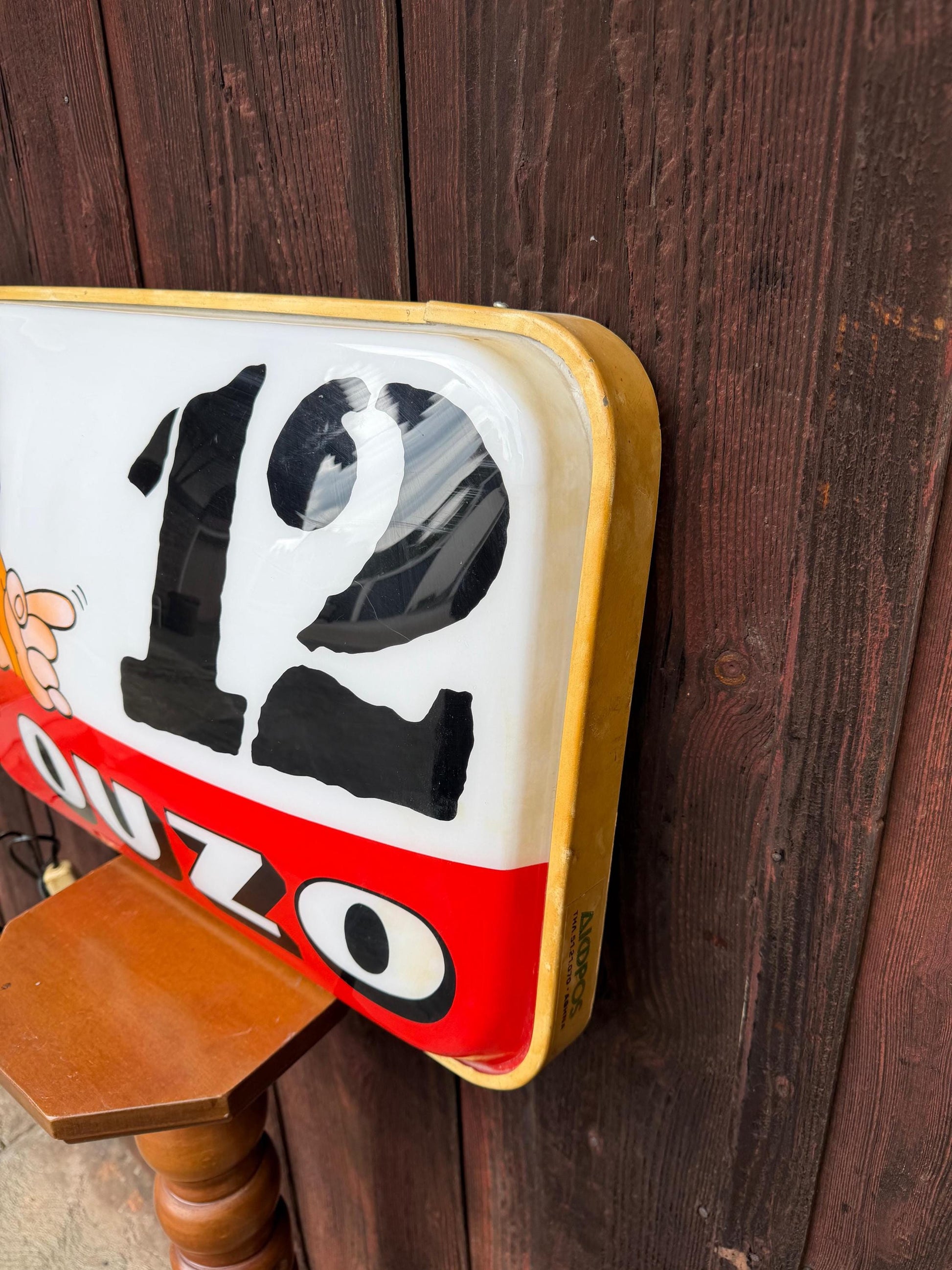 Vintage Leuchtreklame "Ouzo 12"