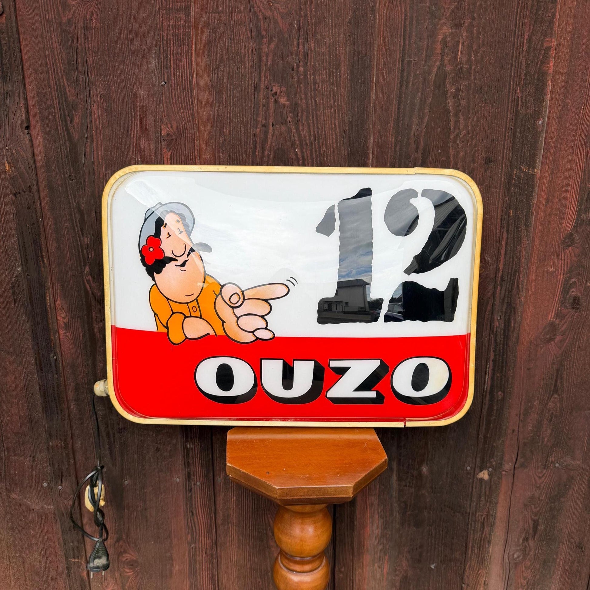 Vintage Leuchtreklame "Ouzo 12"