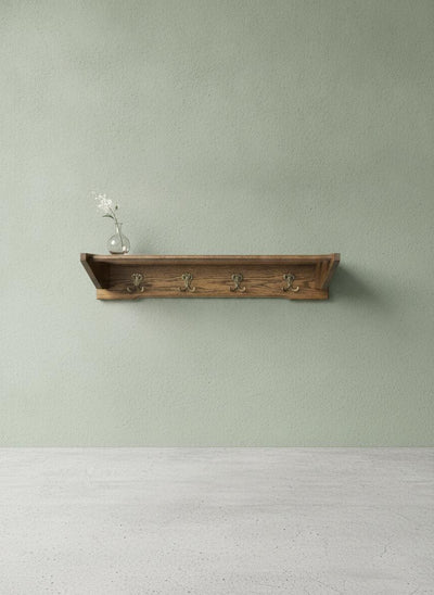Vintage wooden coat rack with brass double hooks and shelf