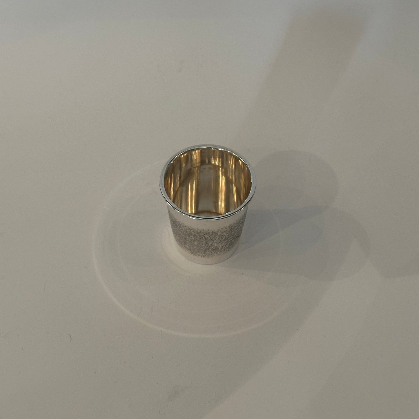 Vintage silver cup by Cartier with cross-hatch decoration