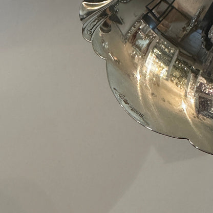 Vintage silver bowl with foot by Cartier decoratively engraved