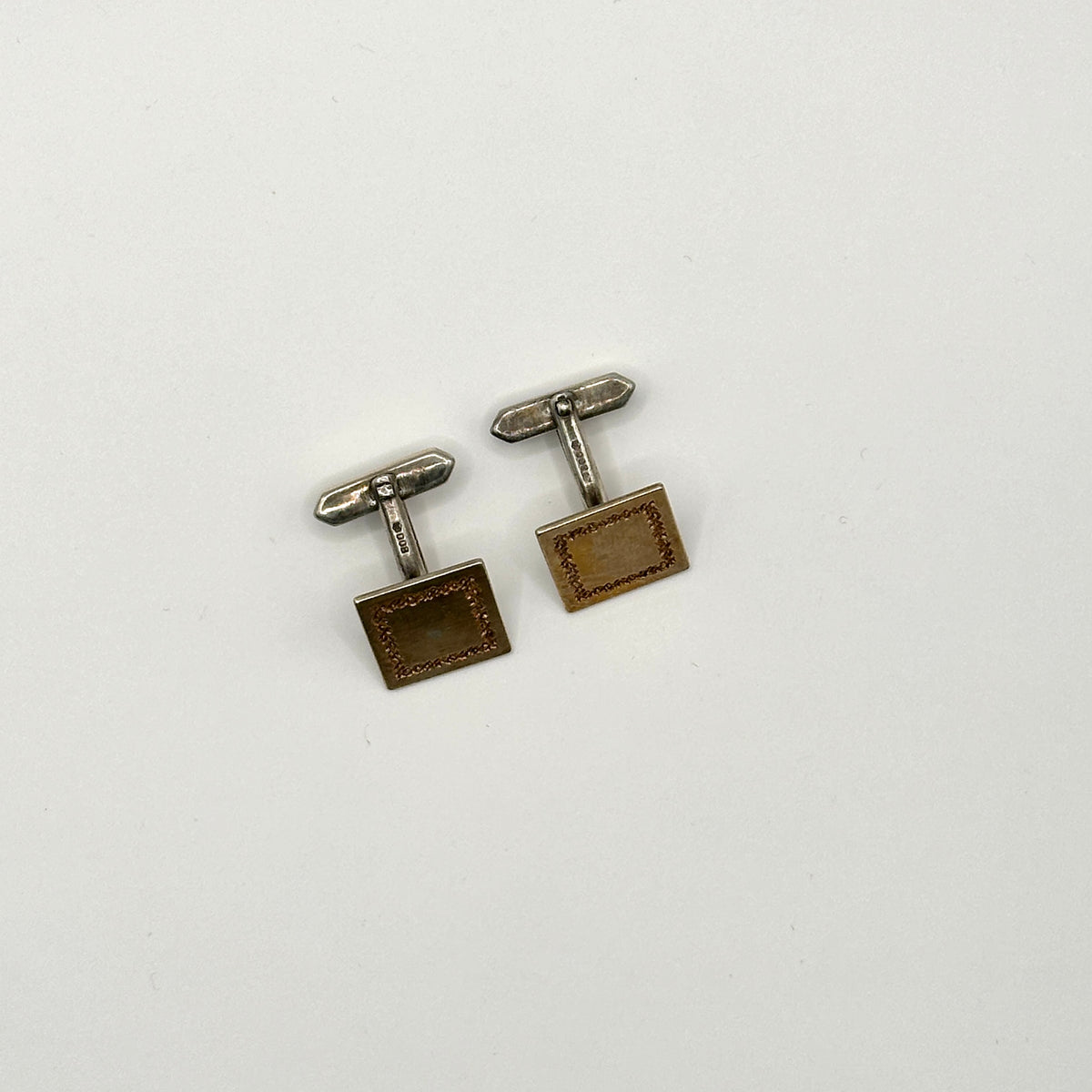 Vergoldeter Manschettenknopf aus 800er Silber