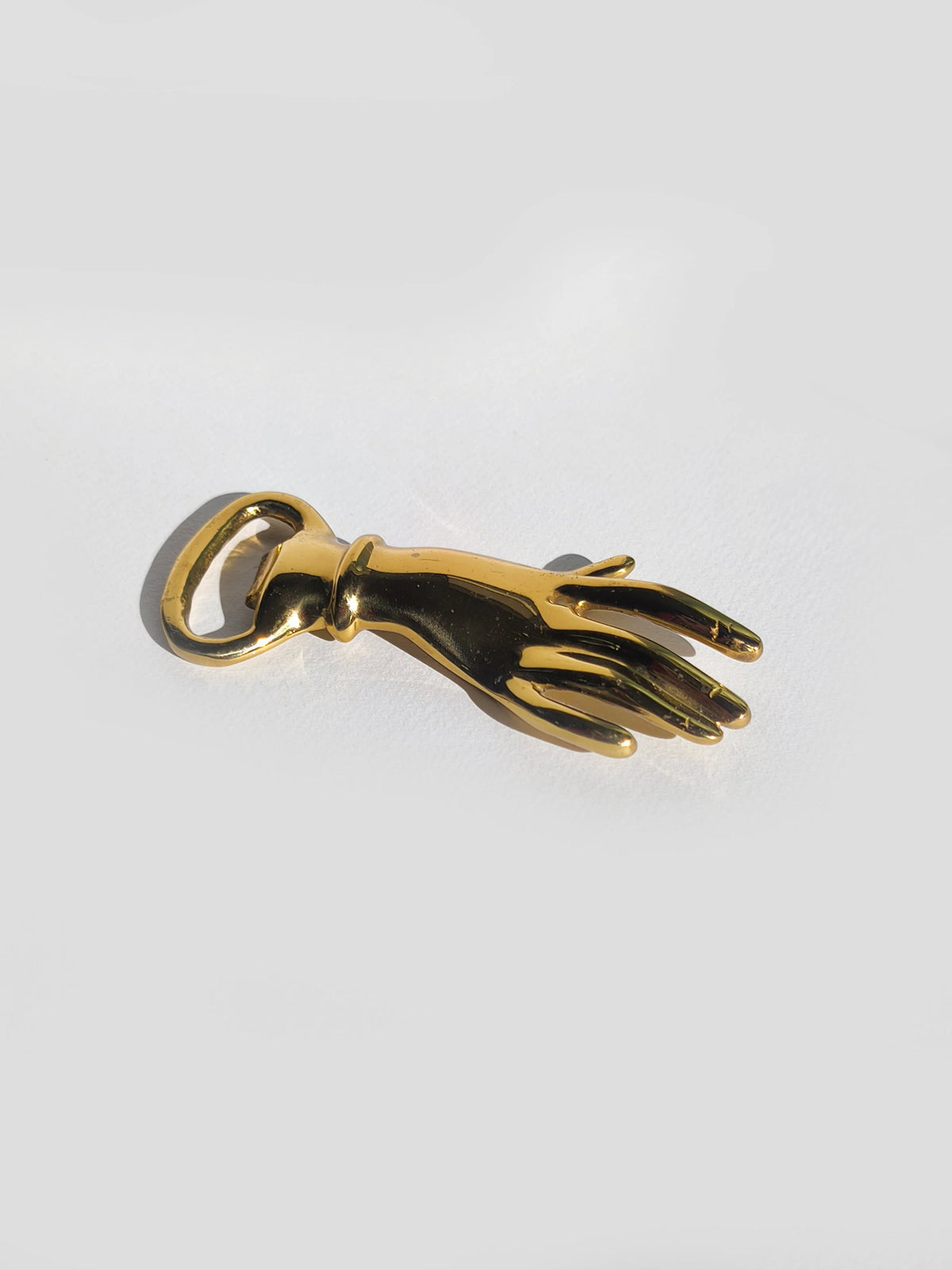 Vintage Flaschenöffner Hand aus Messing