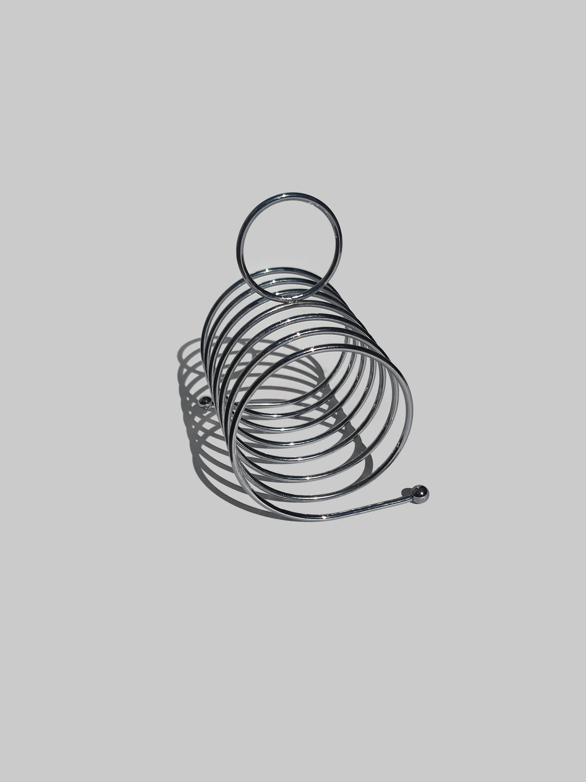 Art-Deco-Toasthalter: Elegantes Silber, Vintage-Charme