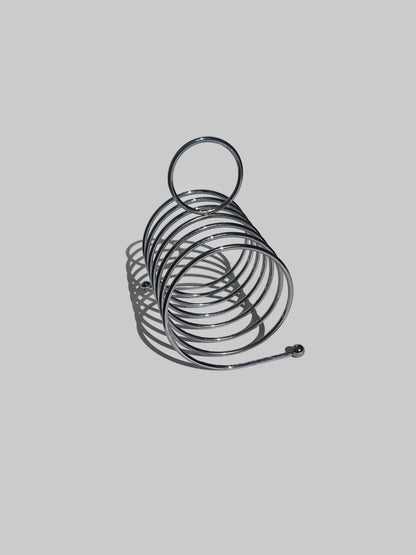 Art-Deco-Toasthalter: Elegantes Silber, Vintage-Charme