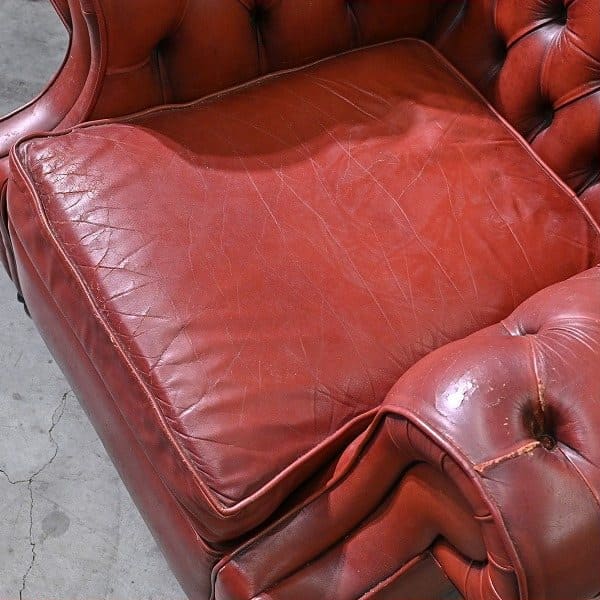 Vintage Sessel Chesterfield Leder mit Rollen