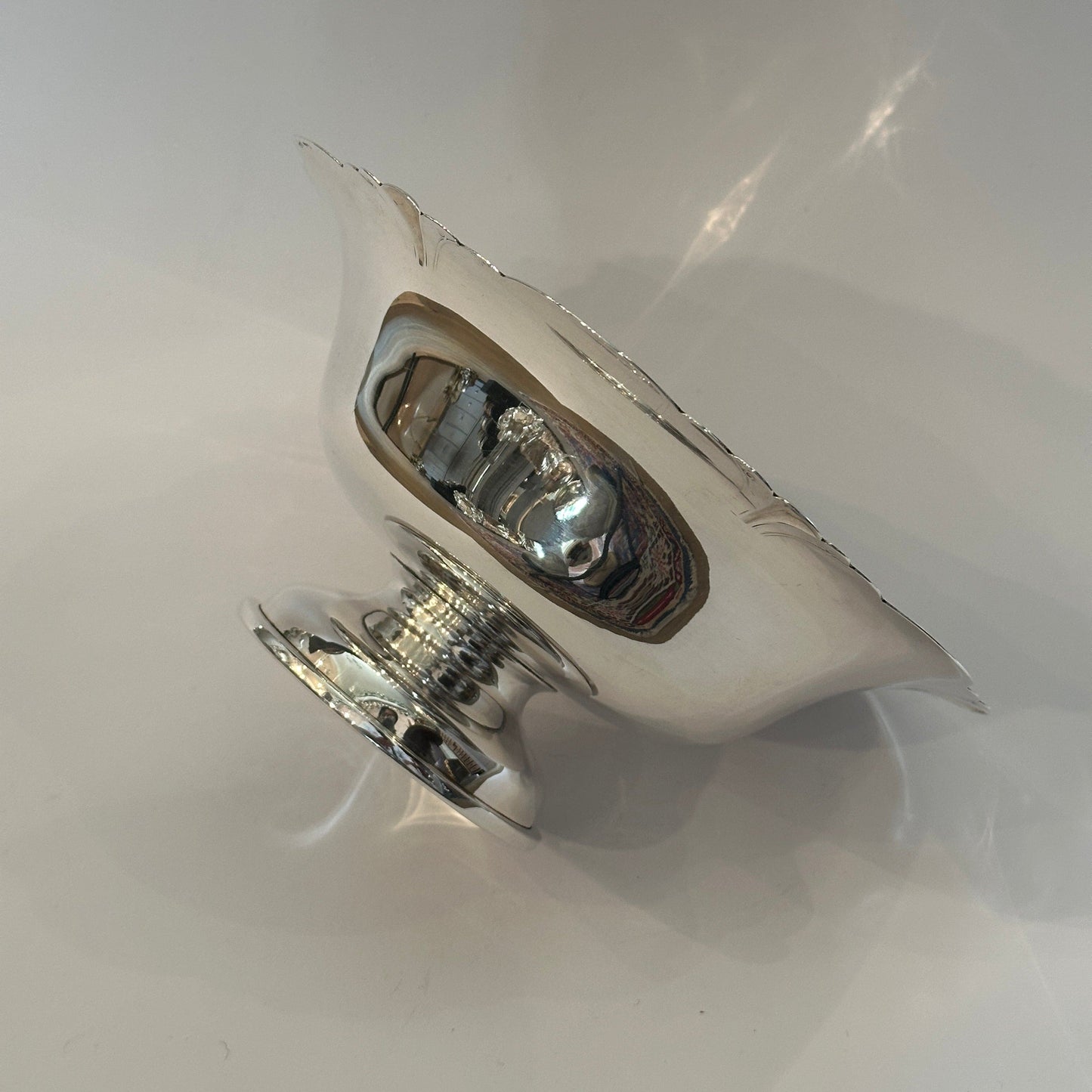 Vintage silver bowl with foot by Cartier decoratively engraved