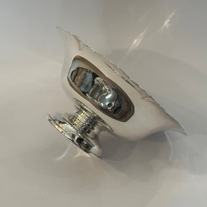 Vintage silver bowl with foot by Cartier decoratively engraved