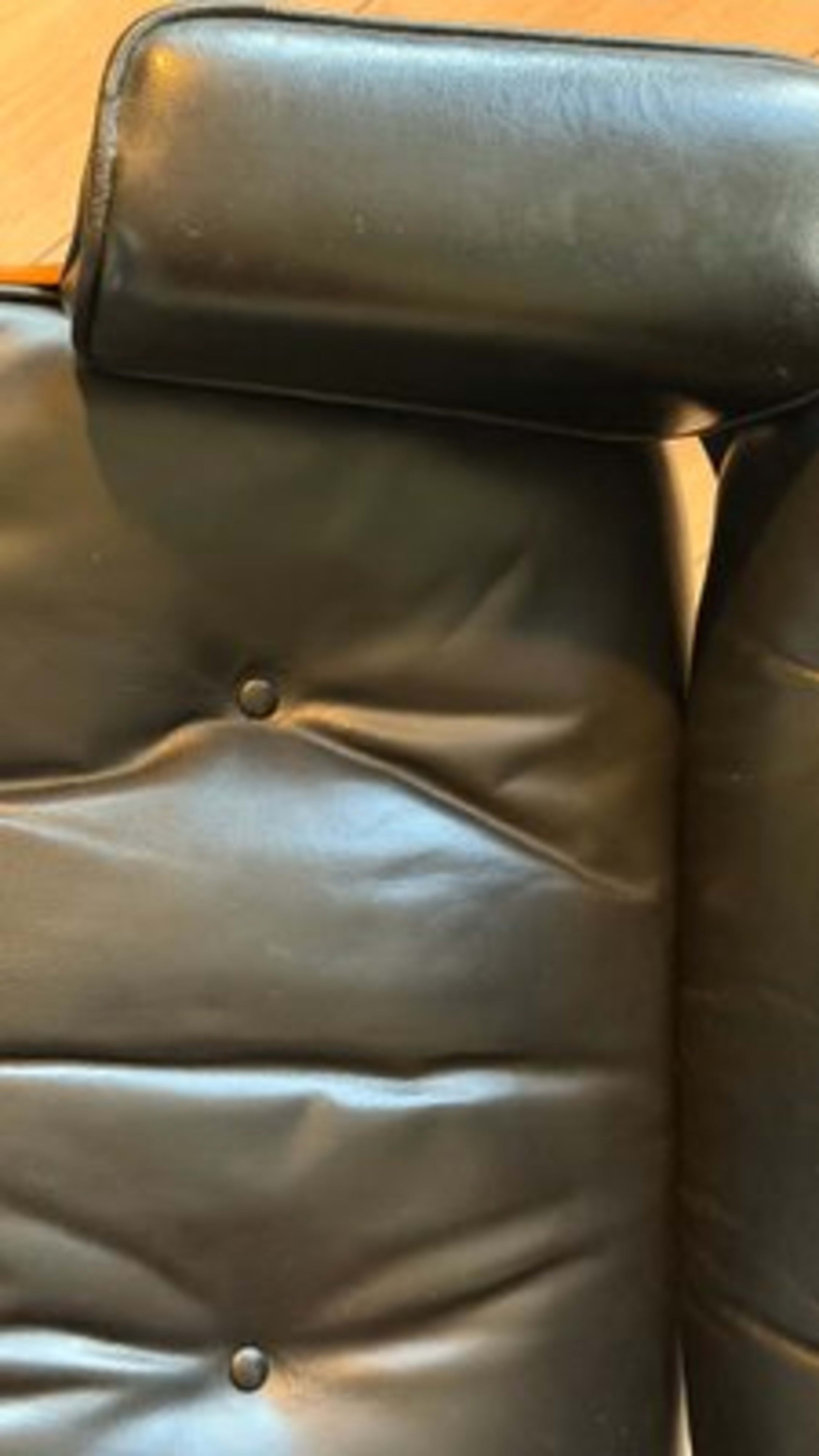 Vintage Sessel und Fußhocker von Charles und Ray Eames für Herman Miller und Vitra