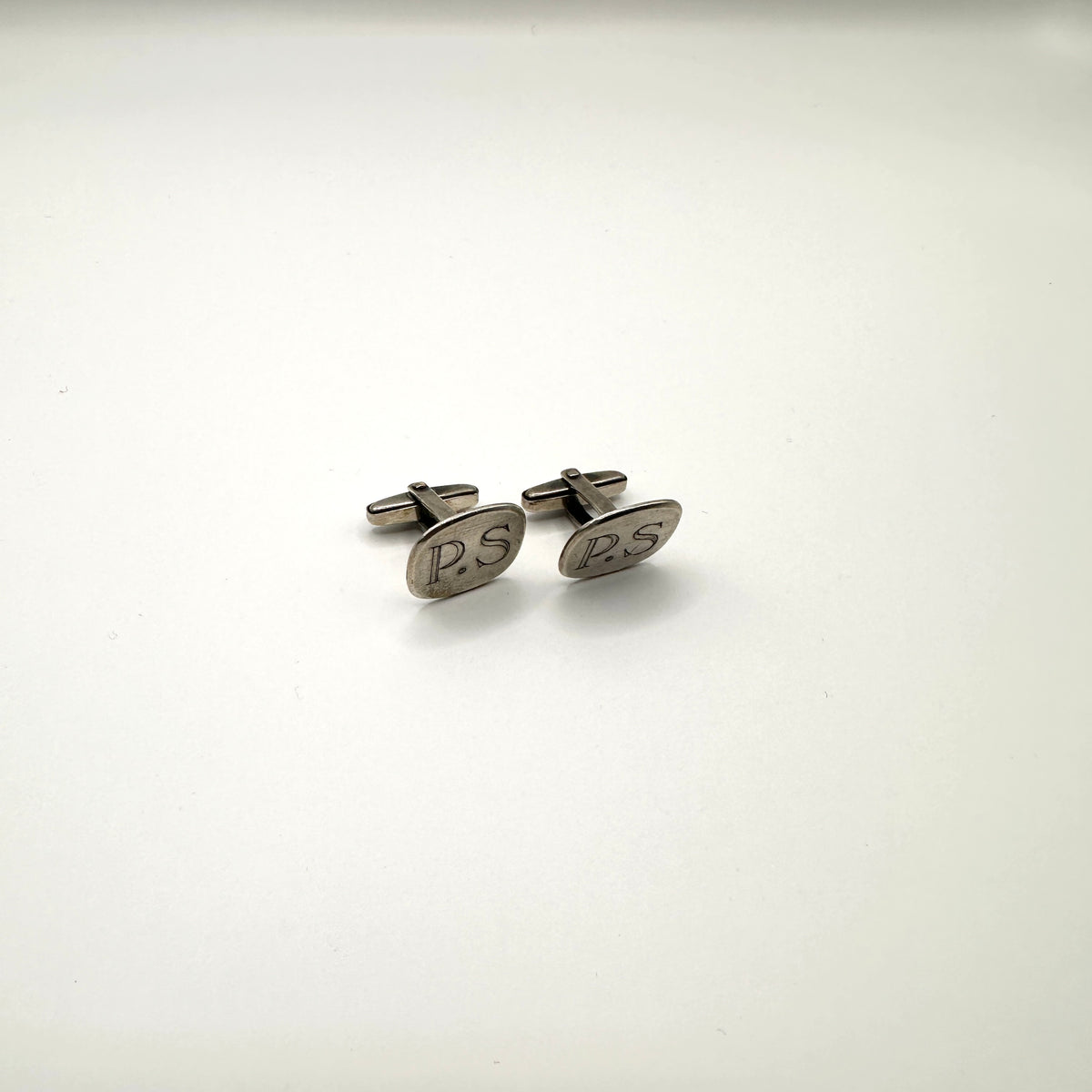 Vintage Manschettenknopf „P.S.“ aus 800er Silber