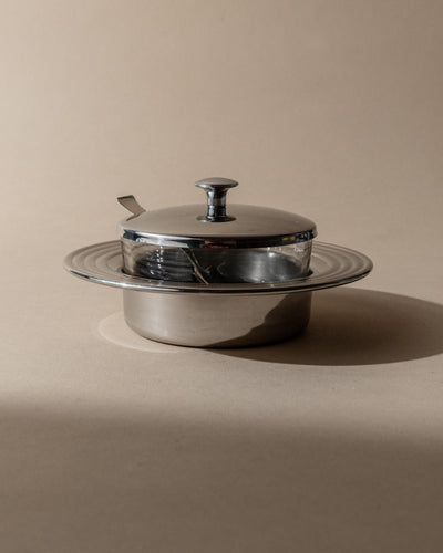 Vintage lidded glass with spoon, transparent silver-colored serving accessory