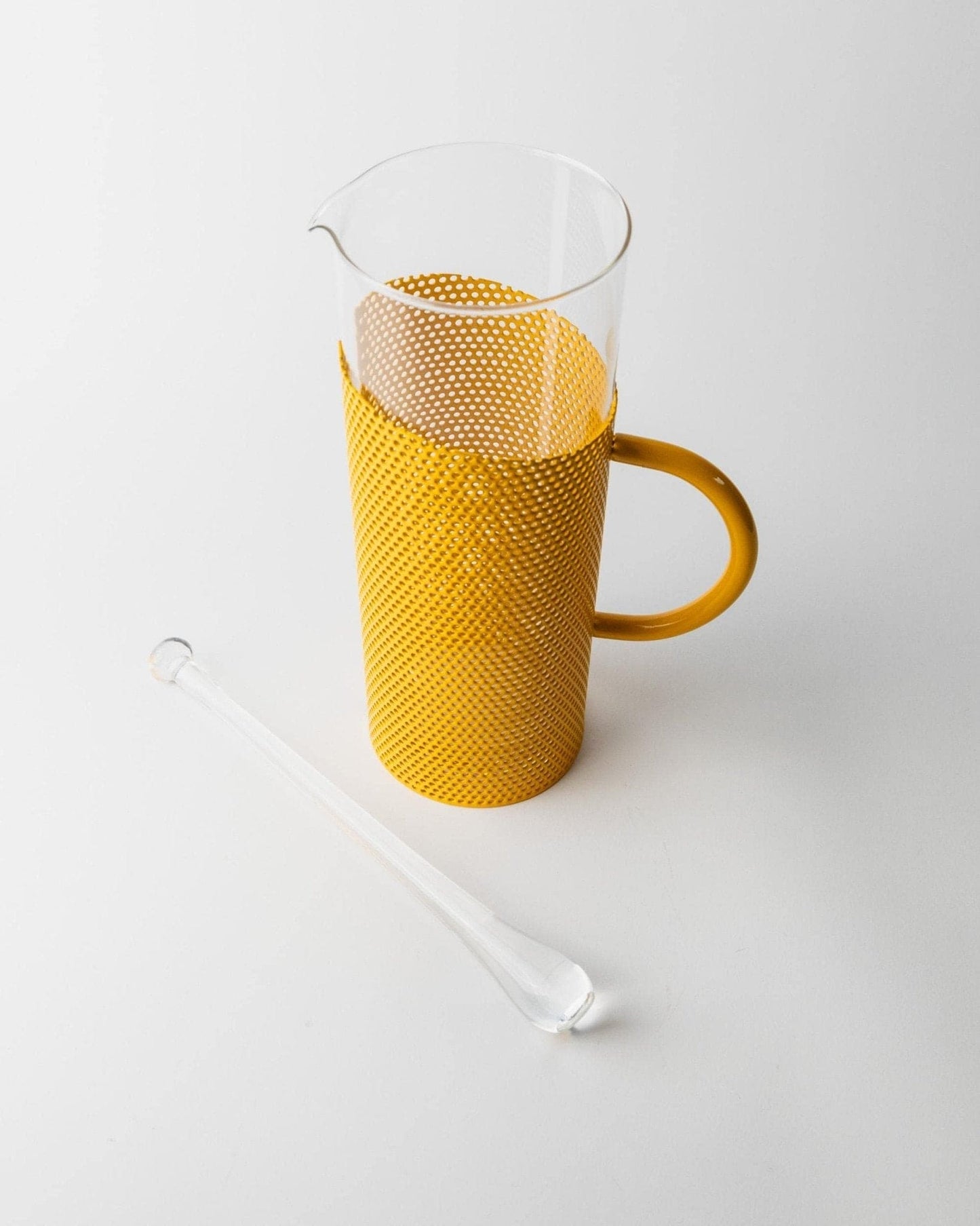 Vintage glass jug with yellow metal handle and glass pestle by De Agostini Memphis style 80s