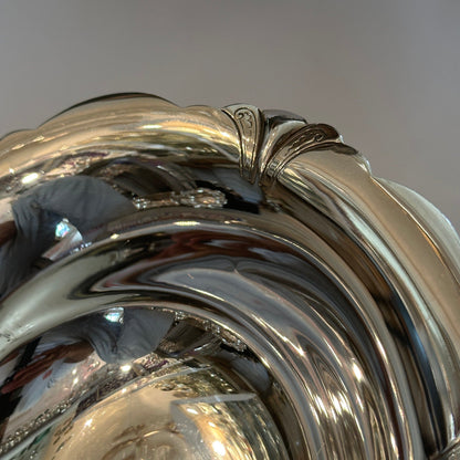 Vintage silver bowl with foot by Cartier decoratively engraved