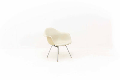Eames fiberglass armchair from Vitra eggshell white