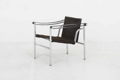 Vintage Loungesessel LC1 von Cassina dunkelbraunem Fell
